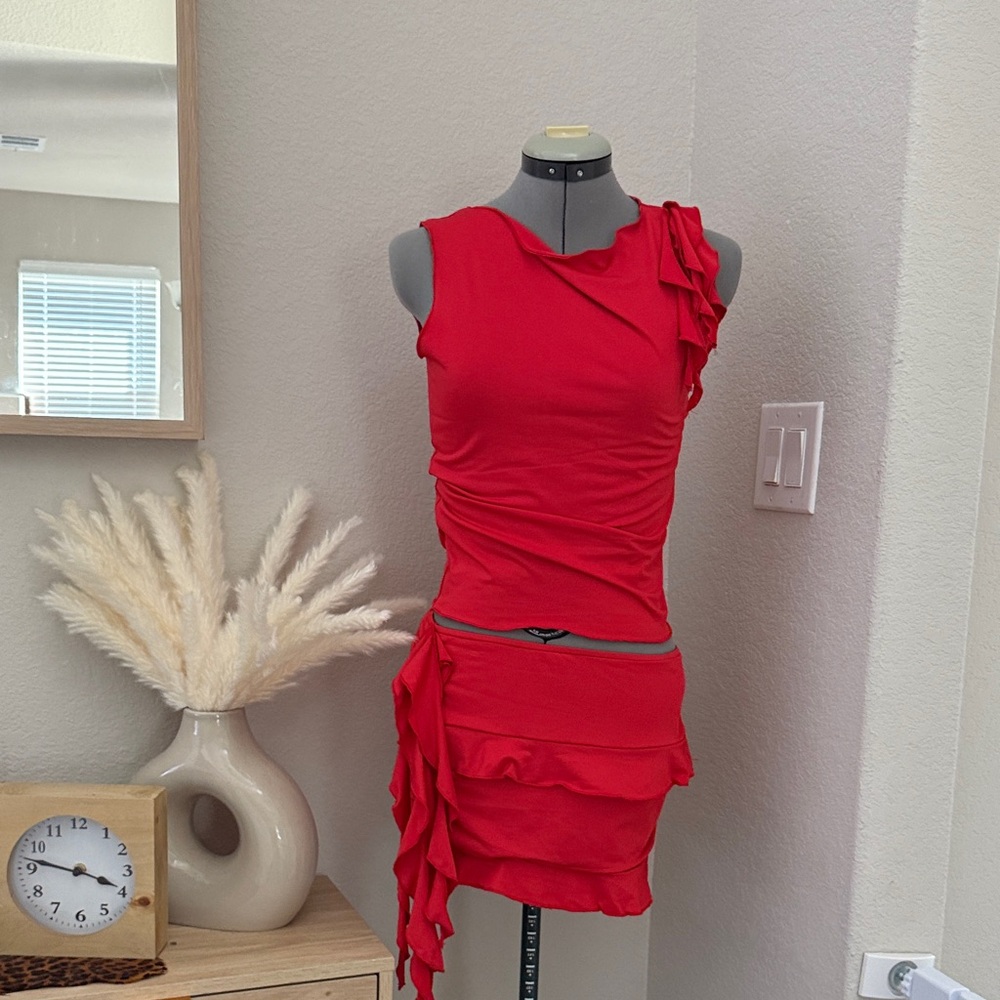 Red Sleeveless Ruffled mini skirt with top.